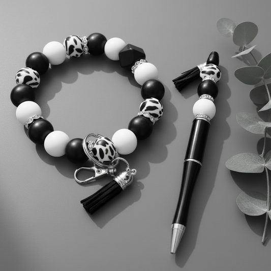 Handmade black and white cow print beaded pen and bracelet set with tassel