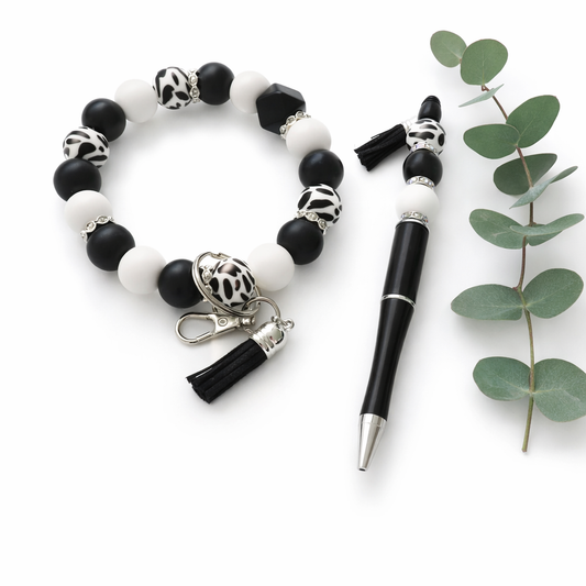 Handmade black and white cow print beaded pen and bracelet set with tassel
