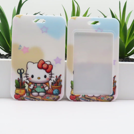 Two phone cases with a cartoon character and colorful design on a white surface with plants in the background.
