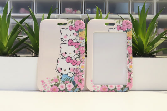 Two cartoon character phone cases with floral designs on a white surface.