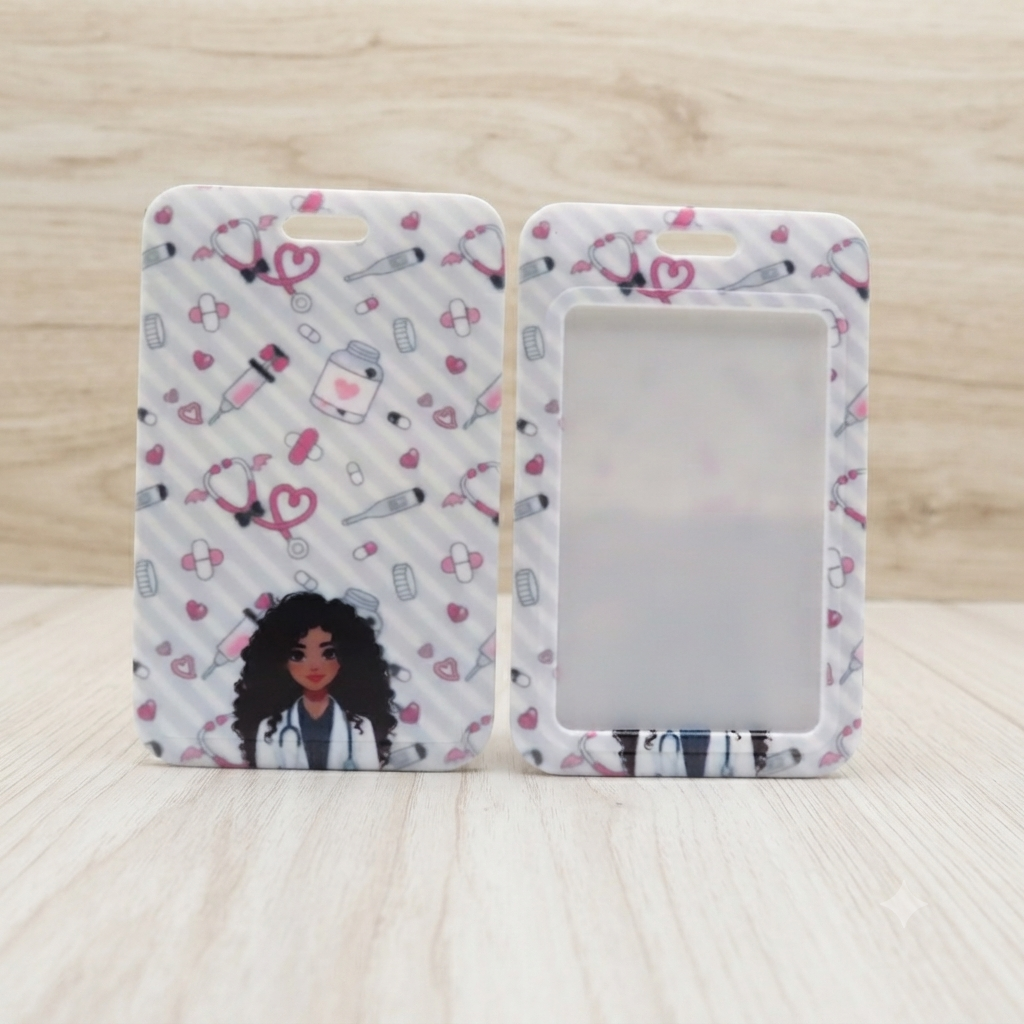 Two phone ID badge holder cases with a medical-themed pattern, displayed on a light wood surface. One case is shown from the back with a printed illustration of a doctor and various medical icons, and the other shows the front with a clear ID window.