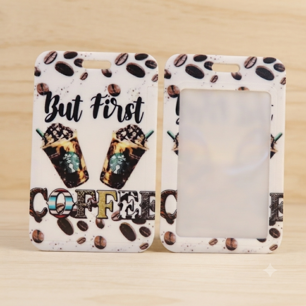 Two white phone cases with a coffee-themed design, displayed side by side on a light wood surface. The left case shows the front design with the text 'But First COFFEE' and illustrations of two Starbucks iced drinks, while the right case shows the back with a blank photo slot.