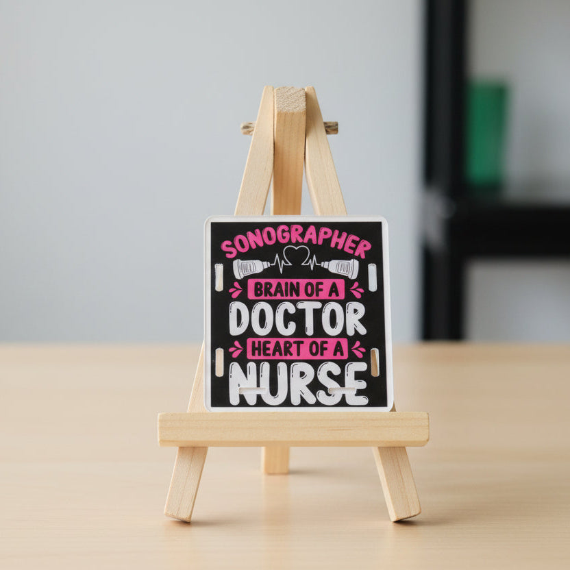 Sticker with text 'Sonographer: Brain of a Doctor, Heart of a Nurse' on a black background