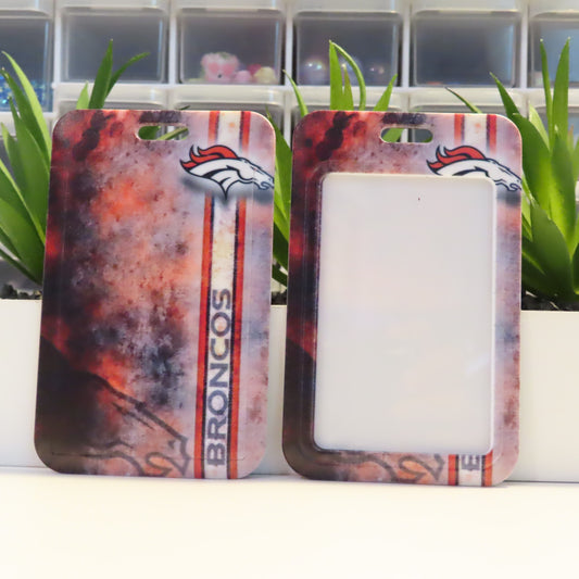 Two Broncos-themed phone cases with a colorful design on a white surface.