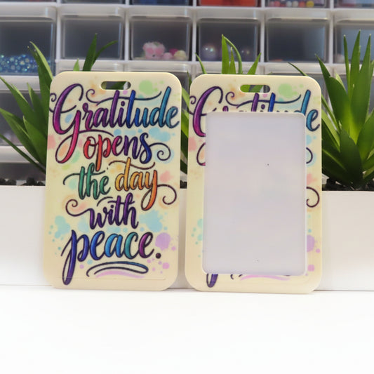 Two phone cases with motivational quote and colorful design on a white surface.
