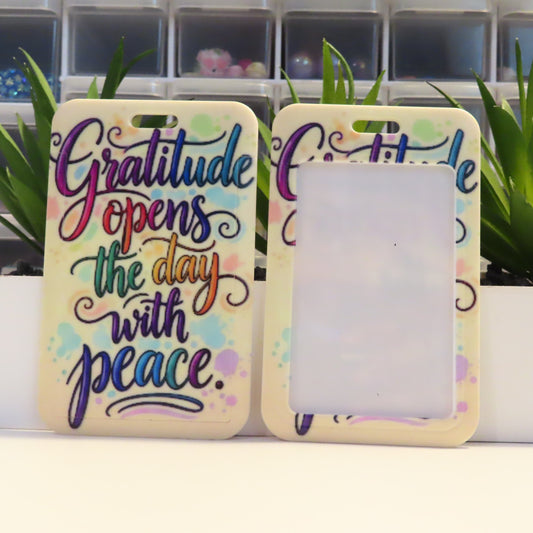 Two phone cases with motivational quote and colorful design on a white surface.