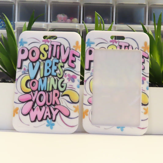 Phone case with 'Positive Vibes Coming Your Way' text on a white background