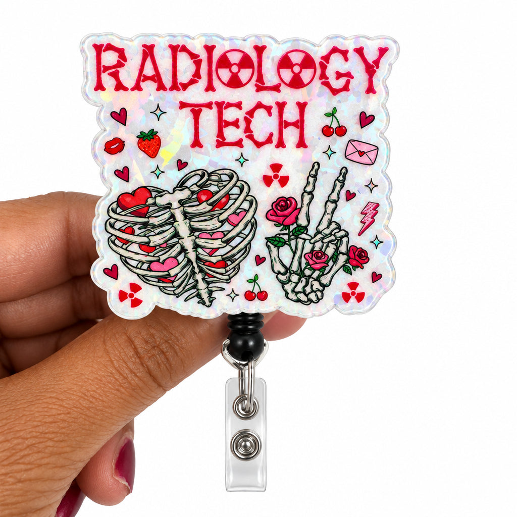 A hand holding a scalloped clear acrylic badge reel cover featuring a 'Radiology Tech' theme with skeleton ribcage, rose-painted hands, and red hearts on a white background.