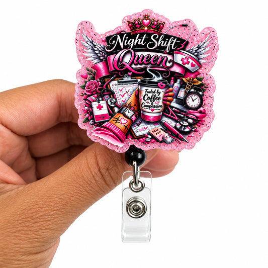 A hand holding a pink die-cut acrylic badge reel featuring a tattoo-style design with the text 'Night Shift Queen' and illustrations of cosmetics and drinks, on a plain white background.