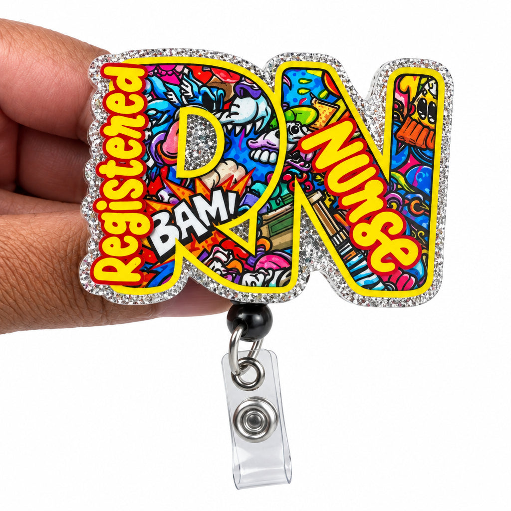 A hand holding a colorful, glittery 'RN' badge with 'Registered Nurse' text and a clear plastic clip attached, set against a plain white background.