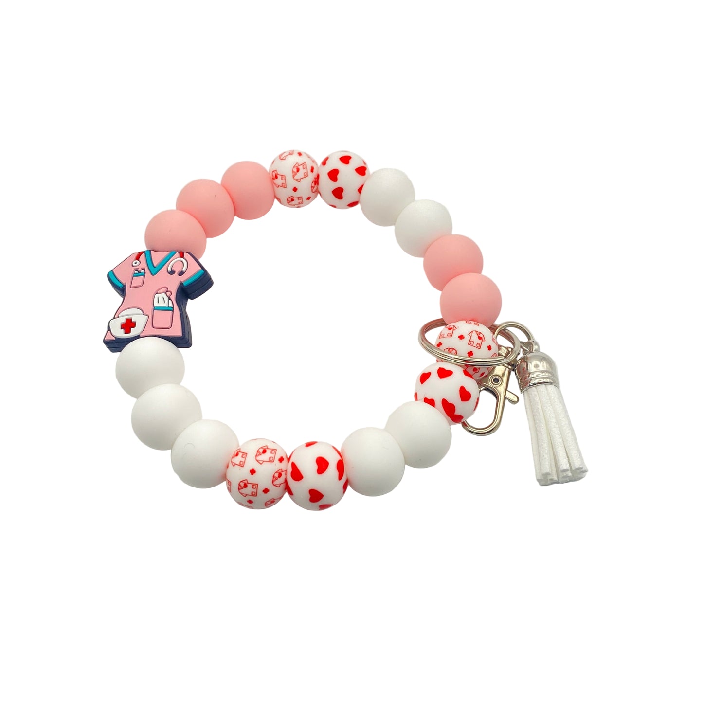 Bracelet with pink and white beads and a keychain on a light gray background