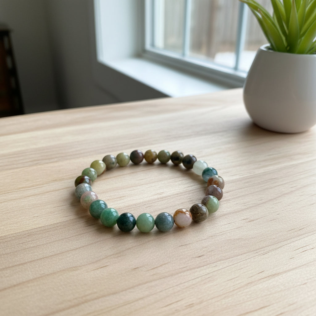 Multicolored beaded bracelet on a wooden surface