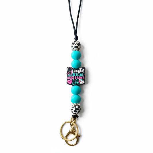 Beaded keychain with a pendant on a gray background
