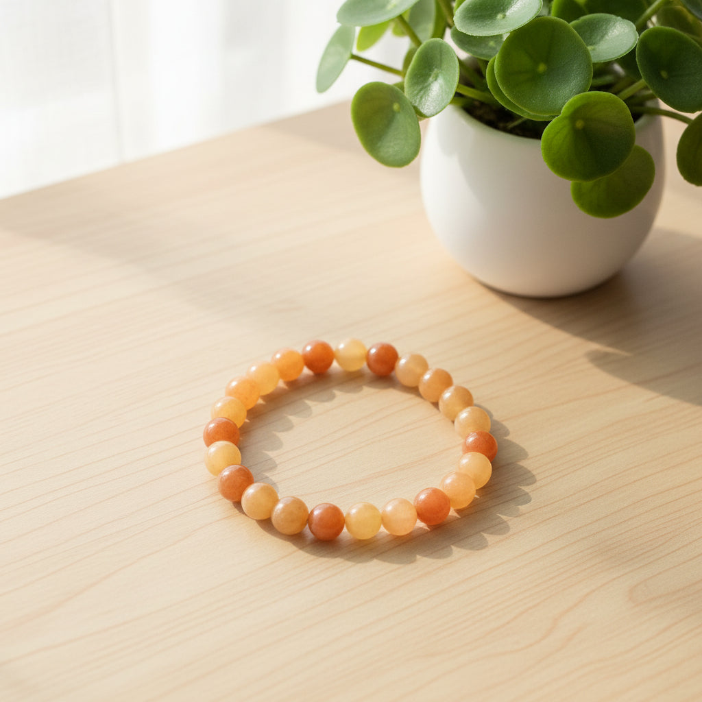 Beaded bracelet with multicolored beads on a dark wooden surface