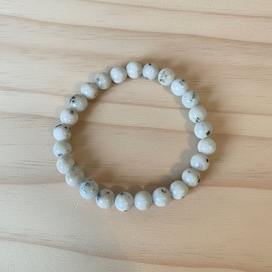 Beaded bracelet on a wooden surface